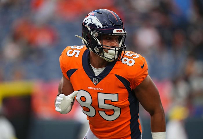 Denver Broncos tight end Albert Okwuegbunam (85) warms up before the preseason game against the Dallas Cowboys at Empower Field at Mile High.